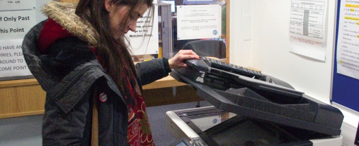 Person using the printer in the McIntyre Building